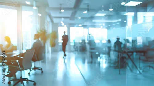 Abstract blurred interior modern office space with business people working banner background with copy space. © Alon
