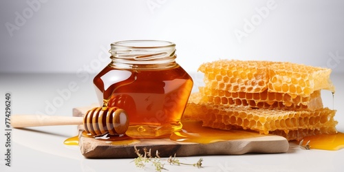 Honey background, banner with jar, dipper and honeycombs on white © alstanova@gmail.com