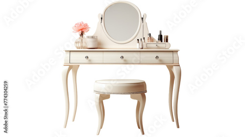 A vanity with a stool and a mirror set against a wall in an elegant room photo