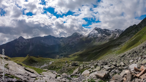 Aerial view of majestic mountain peak Vorderer Geisslkopf in High Tauern National Park, Carinthia, Austria. Idyllic hiking trail Austrian Alps. Wanderlust paradise. Sense of exploration. Nature escape