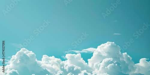 Serene Morning Atmosphere: Clear Blue Sky and Fluffy White Clouds. Concept Sunrise landscape, Calm nature scenes, Peaceful outdoor setting