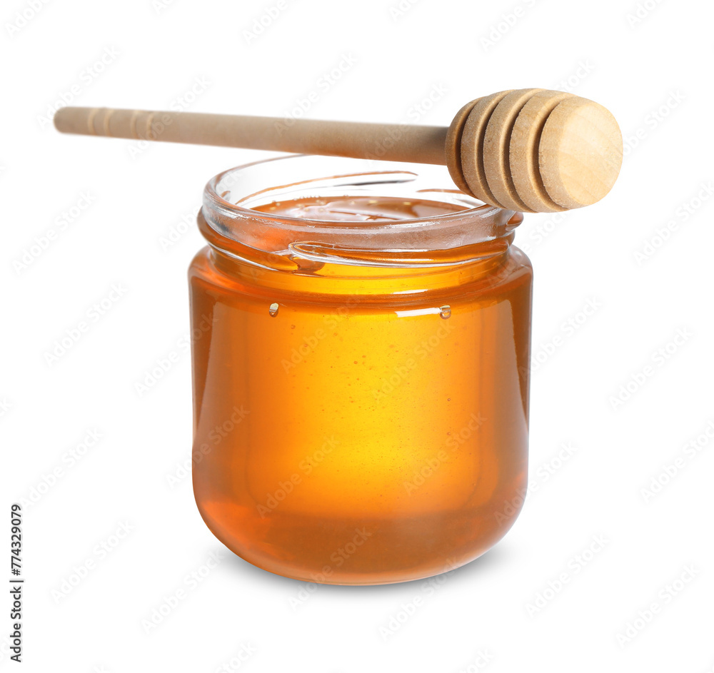 Tasty natural honey in glass jar and dipper isolated on white Tasty natural honey in glass jar and dipper isolated on white