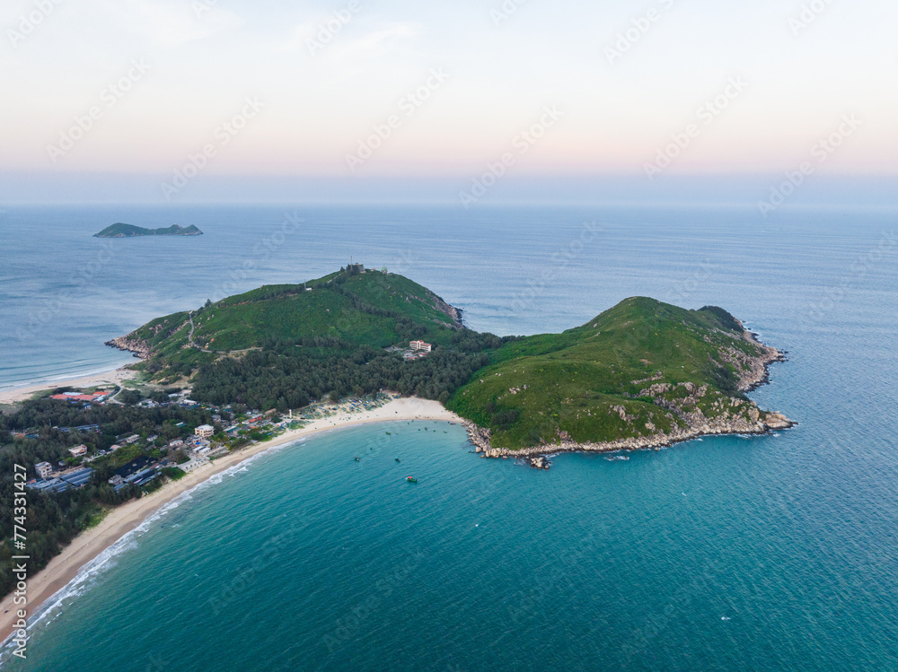 Aerial photography of the summer coastline of Dahuajiao, Wanning, Hainan, China