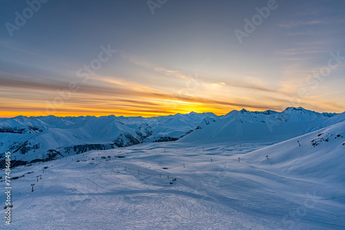 Sunset over snowy mountains