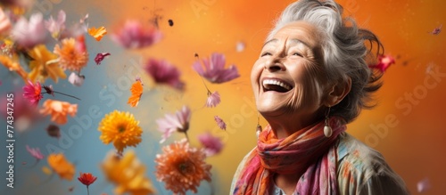 Woman smiling joyfully, surrounded by colorful flowers against a vibrant background