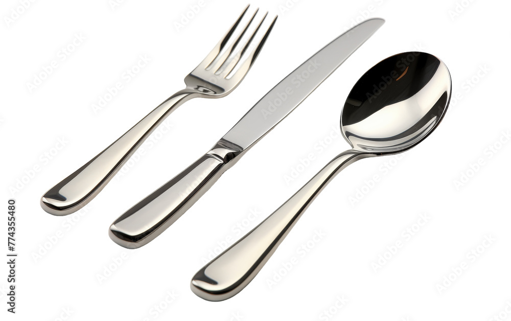 A knife, fork, and spoon elegantly arranged on a white background A knife, fork, and spoon elegantly arranged on a white background