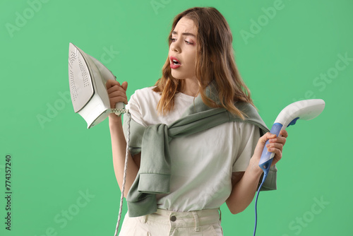 Confused young woman with m...