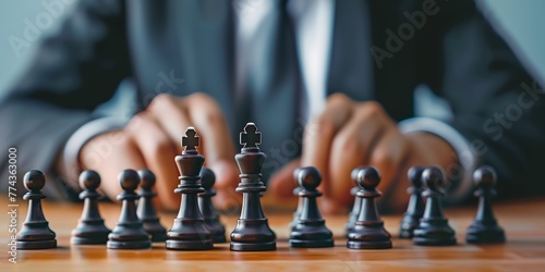 A man is playing chess with a black king and a black pawn