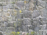 Old stone wall with different size of rocks