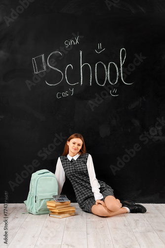 Female student with books a...