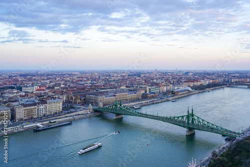 Danube river with Liberty bridge or Freedom bridge in Budapest, embankment with city panorama