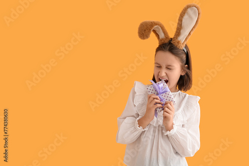Happy little girl in bunny ...