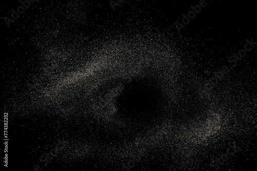 Sand flying, scattered dust isolated on black background and texture