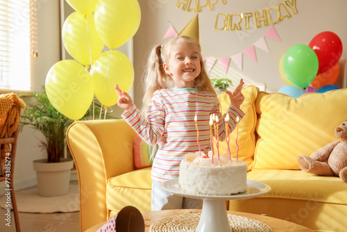 Cute little girl in party h...