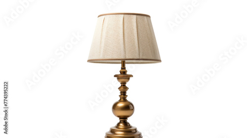 A lamp casting a warm glow on a wooden table