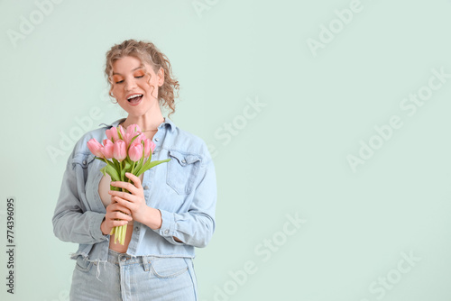 Pretty young woman with bou...