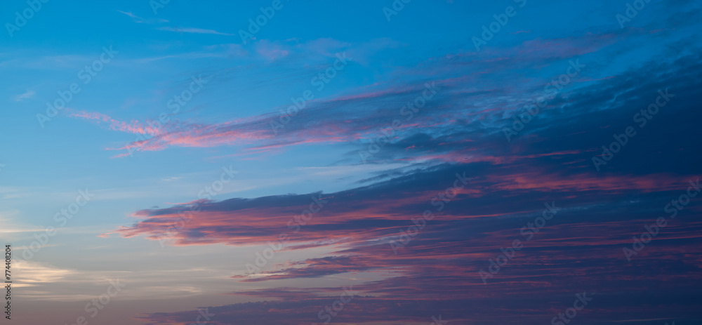 Stunning sunset clouds on the sea with gorgeous colors