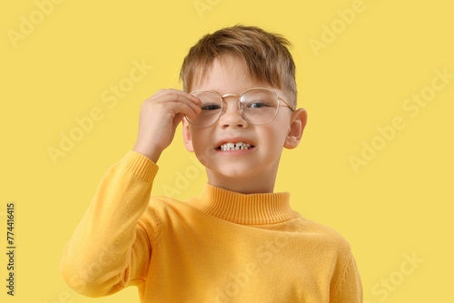 Cute little boy in eyeglass...