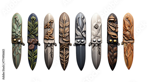 A collection of knives with unique designs lined up in a row photo