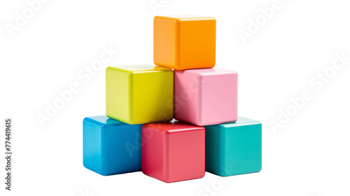 A vibrant stack of colorful cubes balanced precariously on top of each other