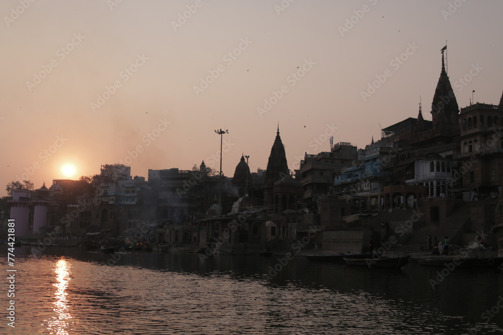 Fototapeta premium Varanasi Ganges Ghats Temples India Sacred Hinduism Pilgrimage Rituals Boat Sunrise Sunset Reflection Spiritual Culture Heritage Tourism Iconic Scenic Views River Asia