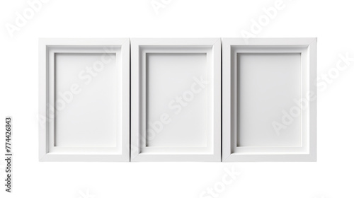 A white wall-mounted cabinet with three doors in a harmonious arrangement © momina