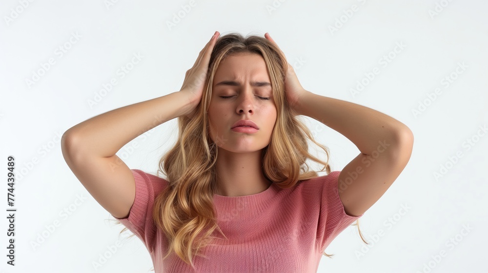 Woman covers ears with hands in discomfort, likely from a headache