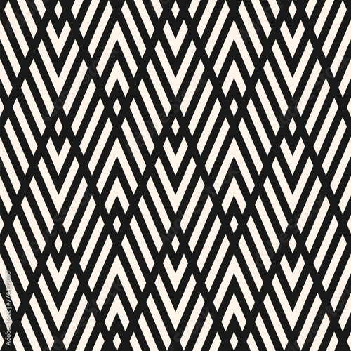 Geometric line seamless pattern. Vector chevron texture. Black and white zigzag stripes, grid, lattice, diagonal lines. Modern abstract monochrome background. Simple geometry. Repeatable geo design