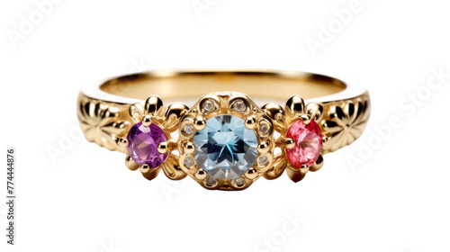 A ring adorned with three distinct colored stones