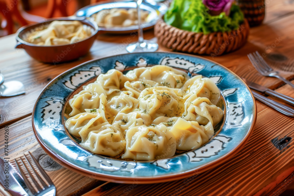 A hearty plate of steaming dumplings is served on a patterned plate, inviting a taste of tradition. A hearty plate of steaming dumplings is served on a patterned plate, inviting a taste of tradition.