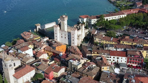 Aerial view or Sirmione village and scaliger castle in the south Garda lake. Brescia province, Italy photo