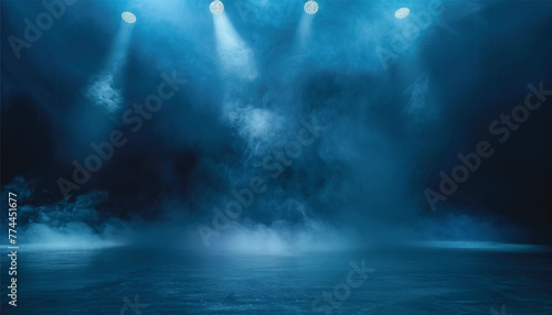 The dark stage with smoky dark blue background. an empty dark room with window shadows for display products. Concert stage with blue spotlight.