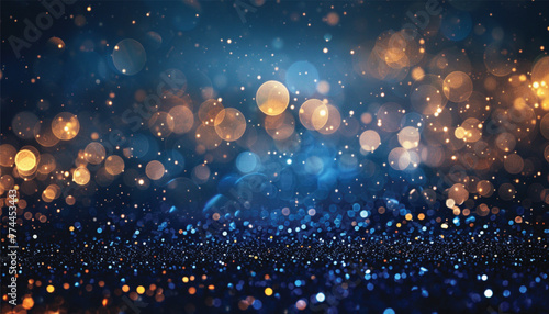 background of abstract glitter lights. blue, gold and black. A close-up view of a blue and gold background with stars. Suitable for celestial, festive, or glamorous designs. photo