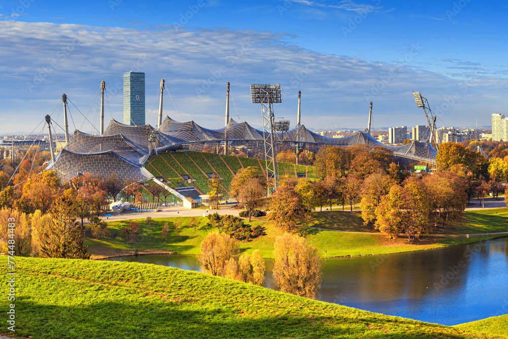 Obraz premium Autumn cityscape - view of the Olympiapark or Olympic Park and Olympic Lake in Munich, Bavaria, Germany