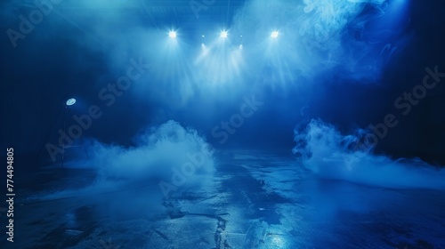 The dark stage shows, dark blue background, an empty dark scene, neon light, spotlights The asphalt floor and studio room