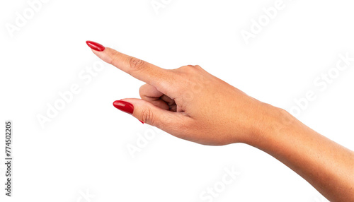 A woman's hand pointing at something with her finger. Red painting nails, female. For use in graphics as attention getter. photo