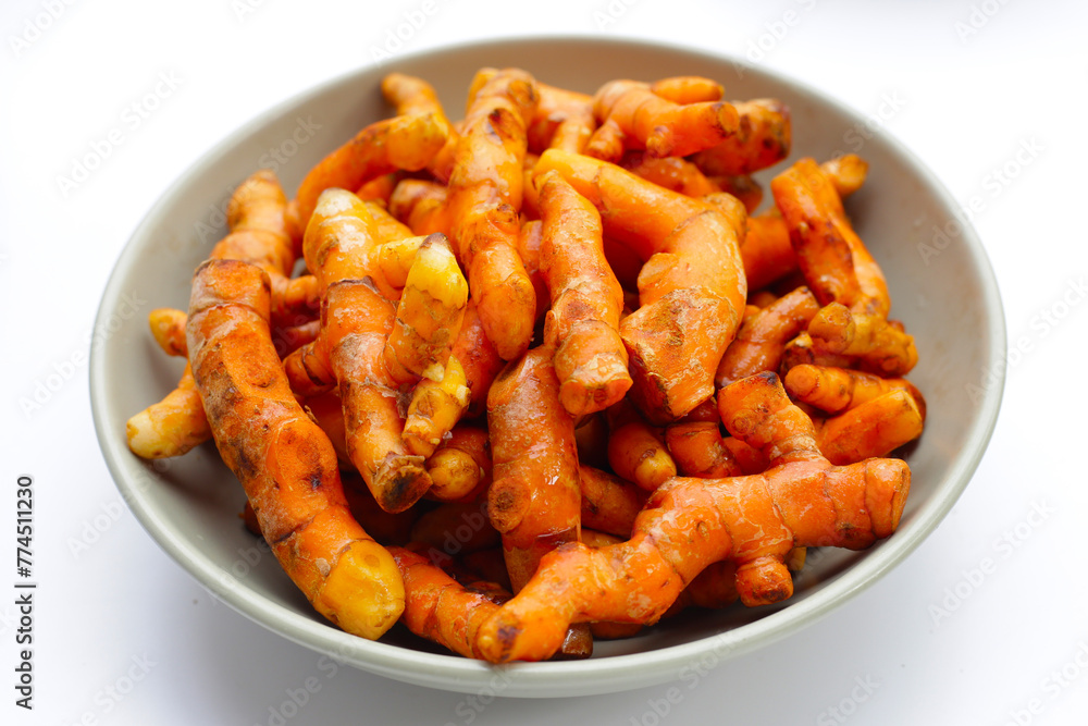 Turmeric roots on white background. Turmeric roots on white background.