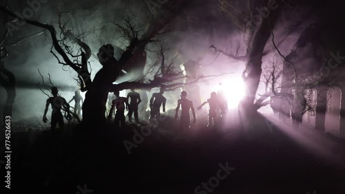 Silhouette of person standing in the dark forest with light. Horror halloween concept. strange silhouette in a dark spooky village