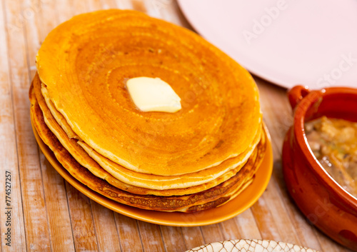 Machanka and pancakes - Belarusian cuisine, traditional assorted dishes photo