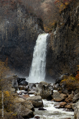 Niigata, Japan - November 7 2023 : Majestic Naena waterfall with beautiful settings in autumn at Joetsu, Japan. photo