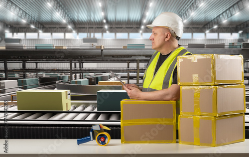 Male Worker with Tablet Ove...