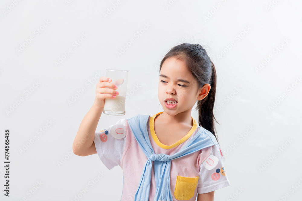 Little Asian girl Image of Asian child drinking milk Little Asian girl Image of Asian child drinking milk