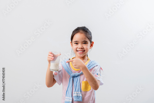 Little Asian girl Image of Asian child drinking milk