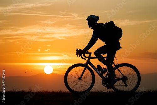 Cyclist against sunset, sport and travel concept, outdoor activity © Jawed Gfx