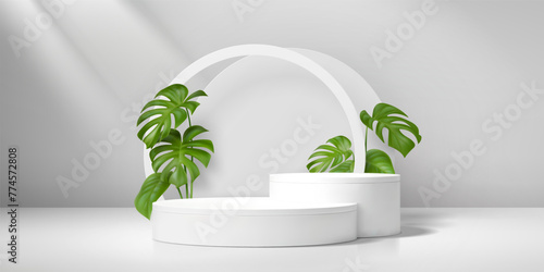 3d white product podium stage with green monstera leaves. Realistic 3d vector background with round platforms or pedestals and arches for natural cosmetic products presentation in studio, empty mockup photo