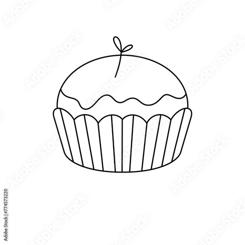 A cupcake with a green leaf on top