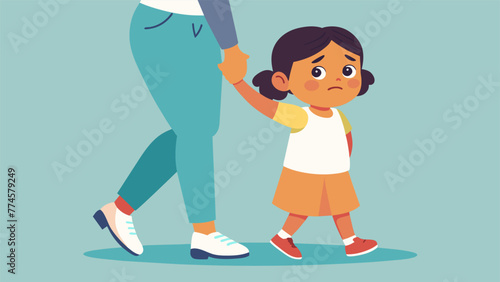 A child holding onto their parents leg and refusing to let go representing the physical clinginess often seen in children with separation