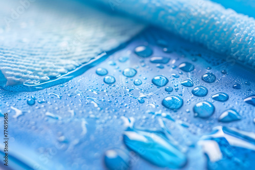Macro Photography of Blue Microfiber Cloth and Droplets