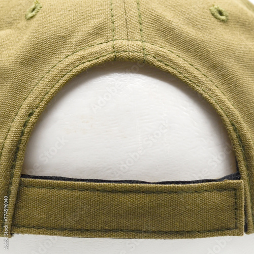 Khaki baseball cap, tracker cap, rear view. Velcro fastener. A blank for the work of a designer. Isolate on a white background. Accessory for athletes, baseball players, bikers, rockers.