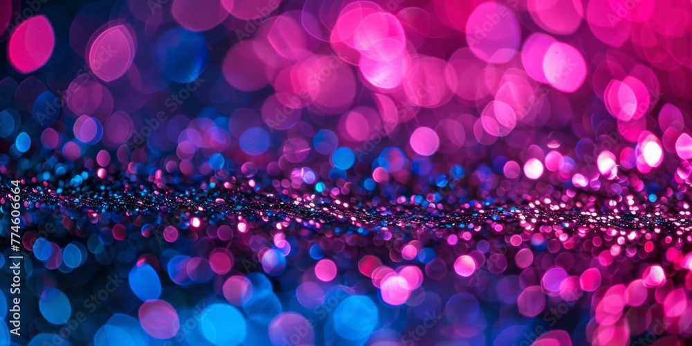 Detailed view of a vibrant purple and blue glittering background, showcasing the intricate sparkle and shine of the colors